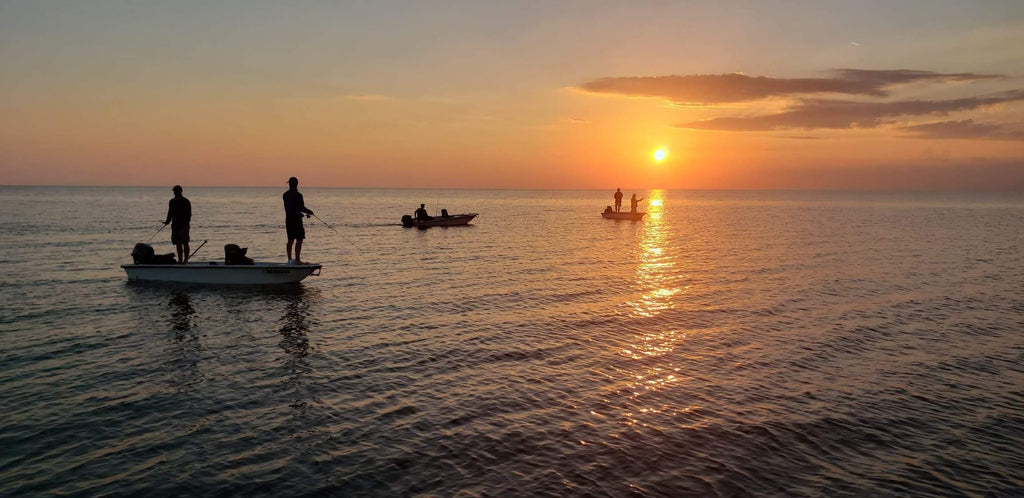 Best Chandeleur Islands Fishing Charter. Men in boats fishing for speckled trout at the Chandeleur Islands.