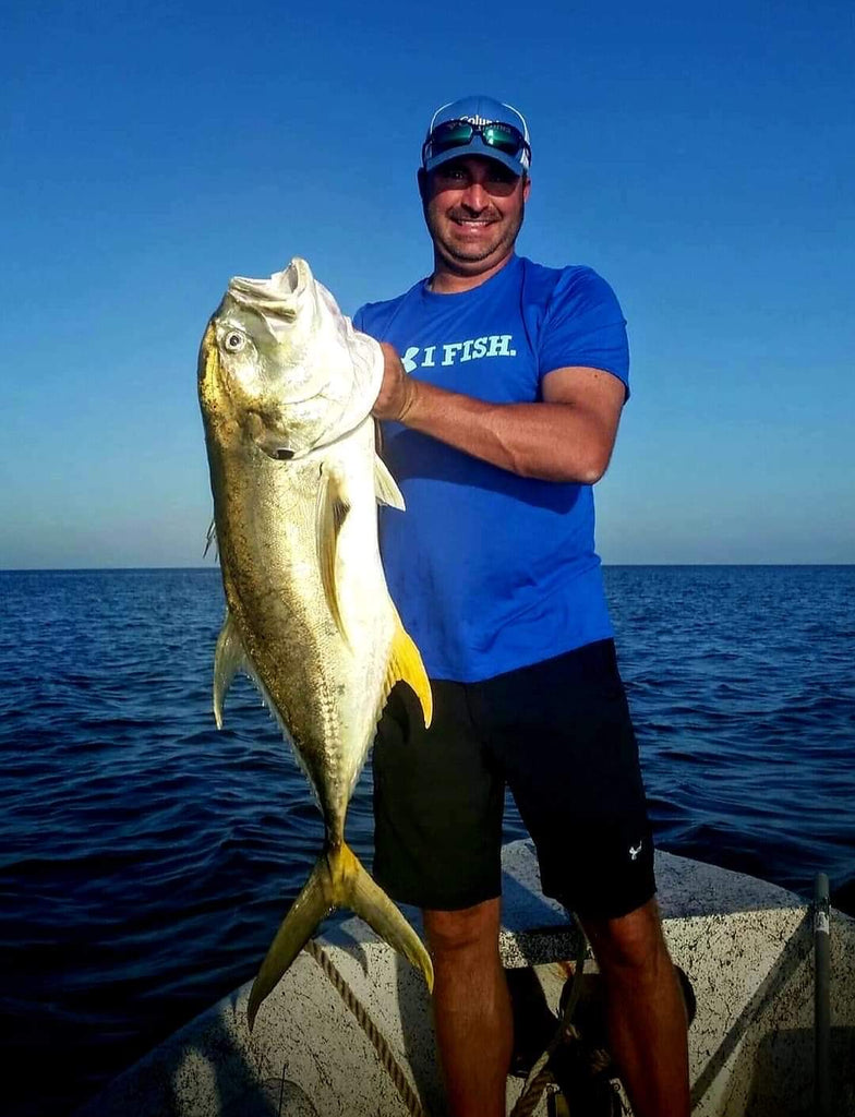 Man holding up huge Jack Crevalle at the Chandeleur Islands.